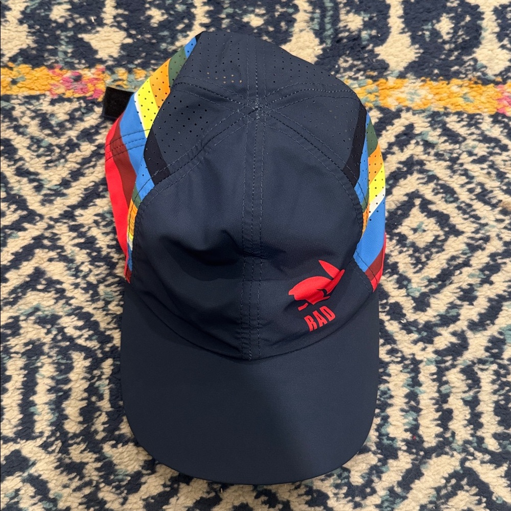2024 Rad Rabbit running athletic hat blue with multicolored stripes